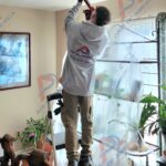 Air duct cleaning technician